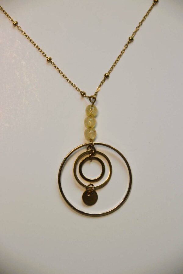 pendentif cercle et perle jaune