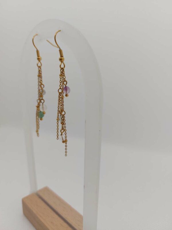 boucles d'oreilles pendantes et mouvantes