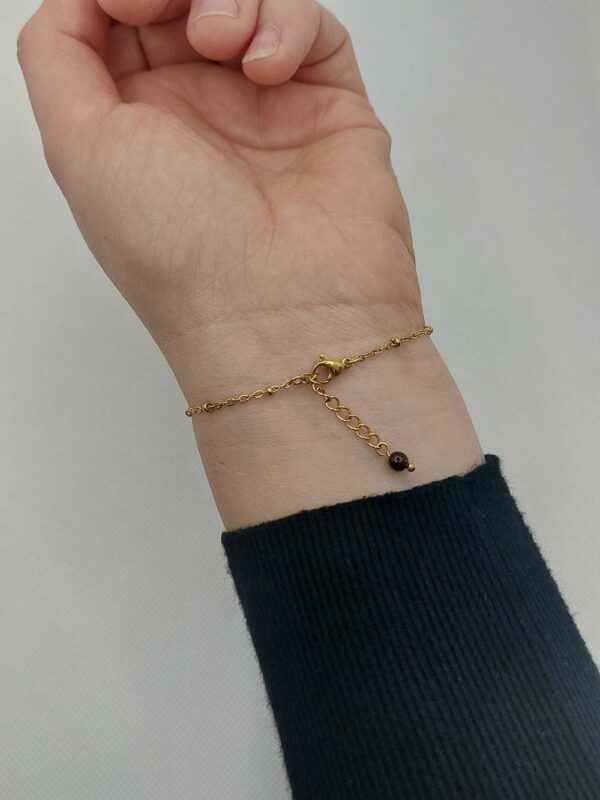 bracelet avec chaine d'ajustement