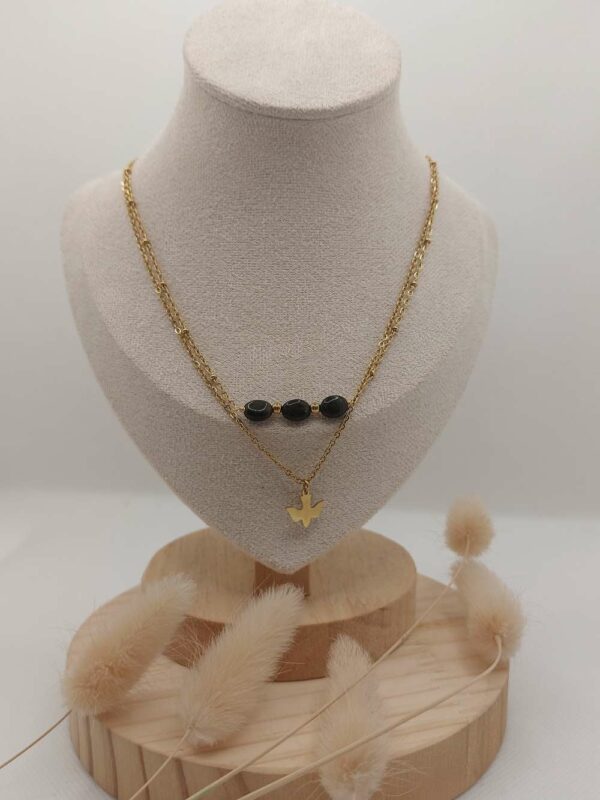 collier double rang obsidienne et oiseau