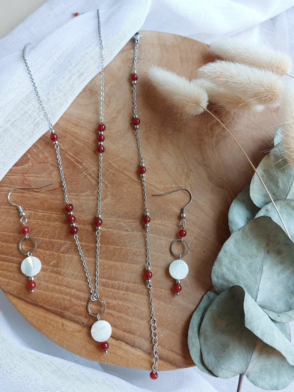 collier, bracelet et boucles d'oreilles en cornaline