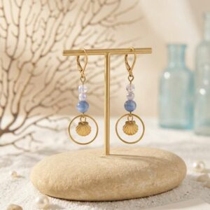 Boucles d'oreilles pendantes avec médaillon coquillage