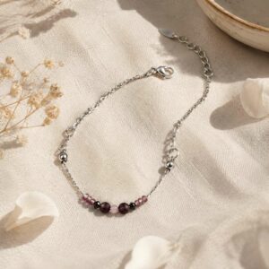 Bracelet argenté avec perle au centre antistress
