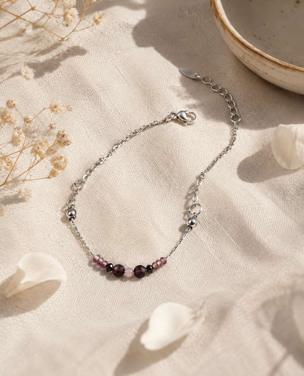 Bracelet argenté avec perle au centre antistress