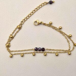bracelet doré avec perles de pierre grenat