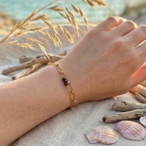 Bracelet doré double rang avec grenat
