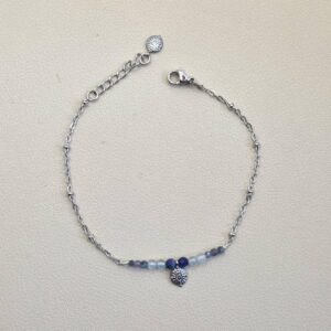 Bracelet argenté avec perle de pierre bleu et médaillon au centre