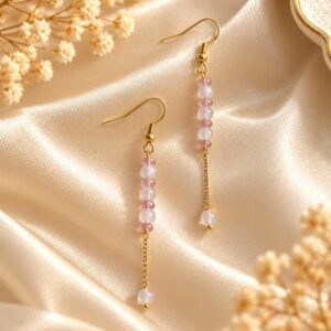 boucles d'oreilles fine élégante, discrete et légère en rose pale